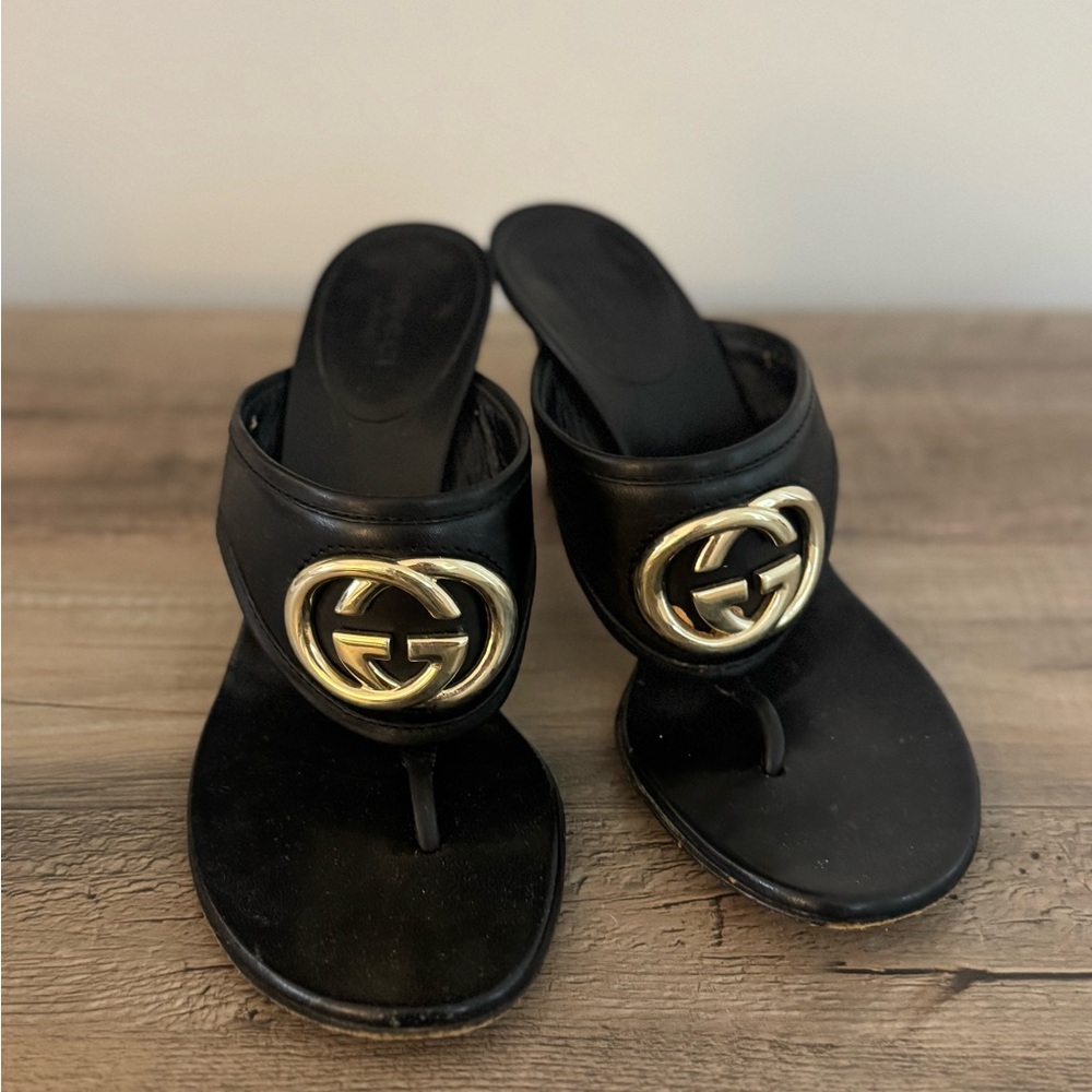 Gucci Black Sandals with Gold Emblem